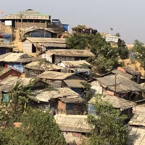 Ramshackle dwellings dot a hillside in the Kutupalong refugee camp, outside Cox's Bazar, Bangladesh.