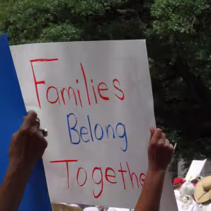 Image of families belong together event banner in Houston