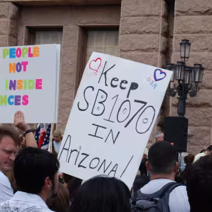 Protesters demonstrate against immigration proposals outside the Texas State Capitol.