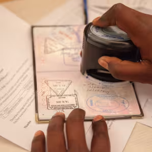 A travel document being stamped in Somalia.