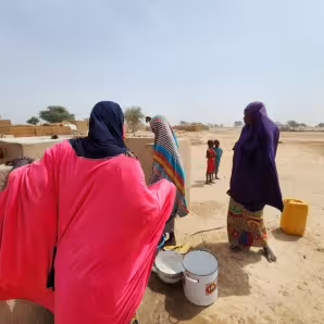 Women at a site for displaced people in Niger.