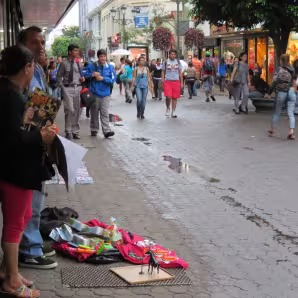 Merchants sell items on a busy street in San Jos&eacute;, Costa Rica.