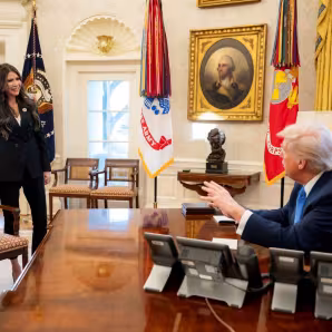 President Donald Trump and Homeland Security Secretary Kristi Noem in the Oval Office.