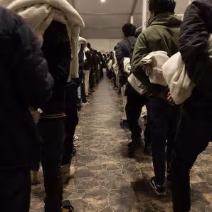 Unauthorized immigrants in the process of being deported from the United States.