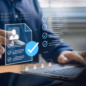 A person uses a digital tool to screen a job applicant