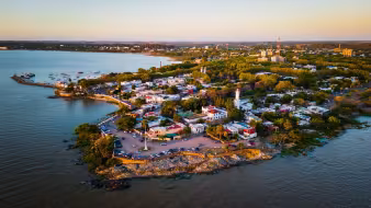 Aerial view Colonia del Sacramento old city lighthouse at sunrise