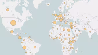 A world map with yellow circles of different sizes on various countries