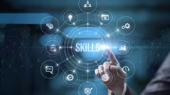 Graphic image of man's hand touching screen with word skills 