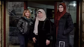 Three Syrian refugee women in Lebanon