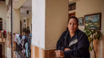 Venezuelan woman in an apartment building