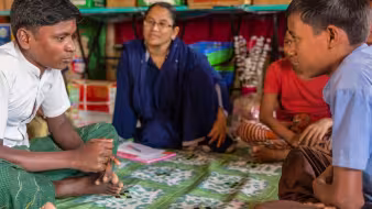 Rohingya children sit in Child Friendly Spaces in Cox's Bazar, Bangladesh