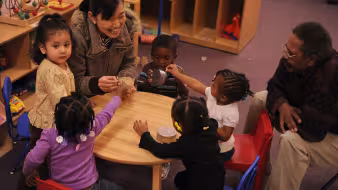 Head Start teacher and students