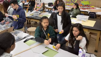 High school students work on a science project