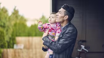 Iraqi refugee father and son