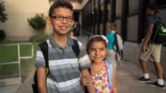 A brother and sister at school