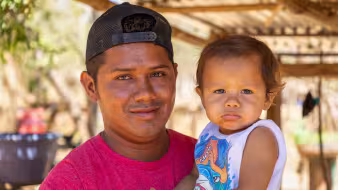 A Honduran man and child