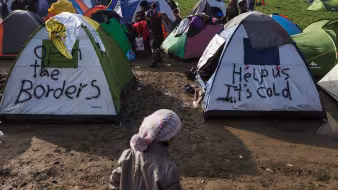 Refugees in makeshift camp on the border between Greece and the Former Yugoslav Republic of Macedonia.