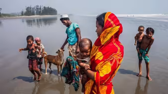 Rohingya family on beach in Teknaf.