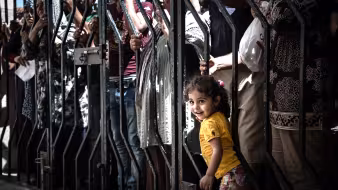Young Iraqi girl at a registration center in Greece