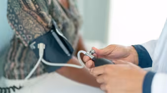 A woman at a routine medical check.