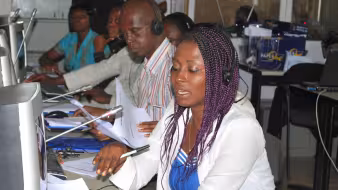 Participants in a program matching Ghanaian workers to jobs in Italy