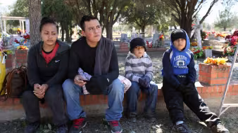 A family of migrants from El Salvador near the U.S.-Mexico border.