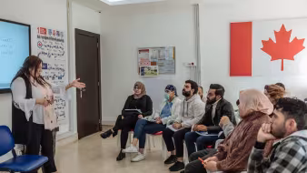 A predeparture orientation for refugees in Lebanon who were selected for resettlement to Canada