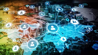 A colorful network of people icons interconnected over a world map
