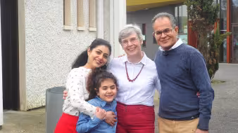 Syrian family and an Irish volunteer in a community sponsorship program