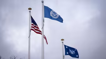 The U.S. and DHS flags