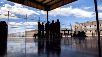 Immigrants in an outdoor space at Eloy Federal Contract Facility