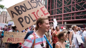 Protesters at a rally in Minneapolis call for abolishing ICE