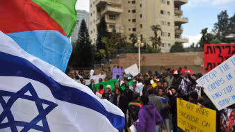A gathering in Tel Aviv for asylum seeker rights