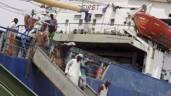 Somali migrants disembarking.