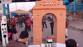 Photo of India gate in Delhi, India featuring names of protestors killed in anti-Citizenship Act demonstrations