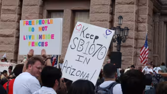 Protesters demonstrate against immigration proposals outside the Texas State Capitol.