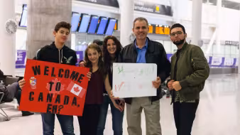 Canadians welcome Syrian refugees to Toronto.