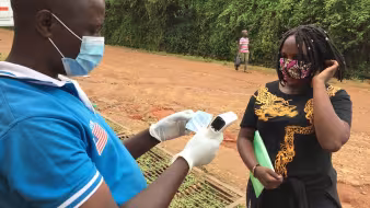 A refugee receives emergency assistance in Uganda.