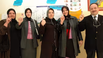 Iraqis voting abroad from Jordan.
