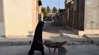 An Afghan woman in the Semnan refugee settlement in Iran.