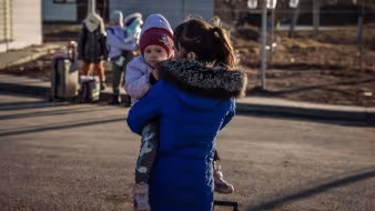 A woman and child at the Moldova-Ukraine border
