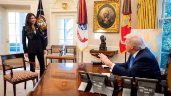 President Donald Trump and Homeland Security Secretary Kristi Noem in the Oval Office.