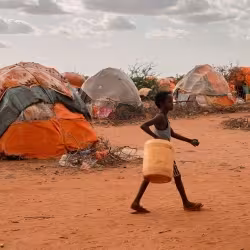 A child carries a jerrycan in Somalia.(Photo: )