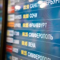 Flight information at an airport inRussia. (Photo: iStock.com/Zozulya)